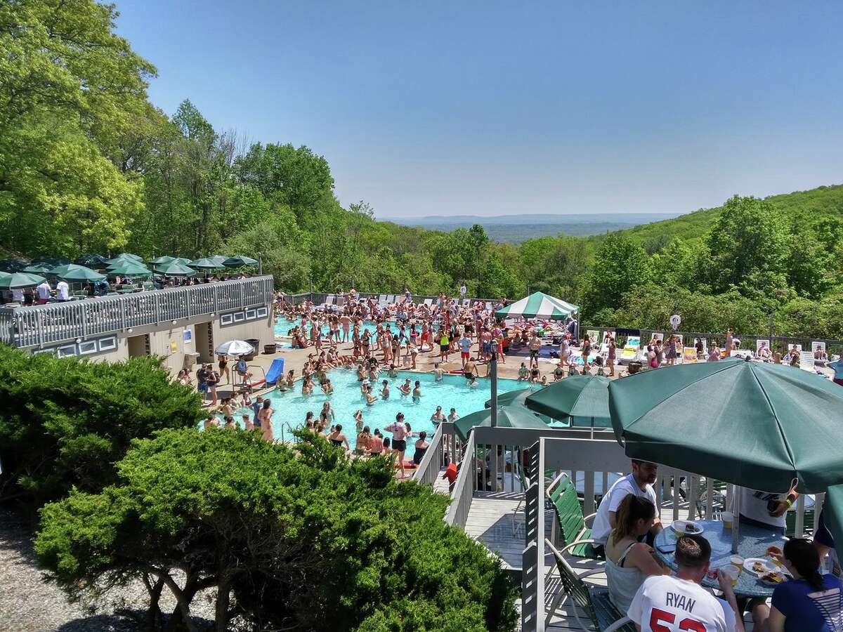 Guests at the pool at Holiday Hill.