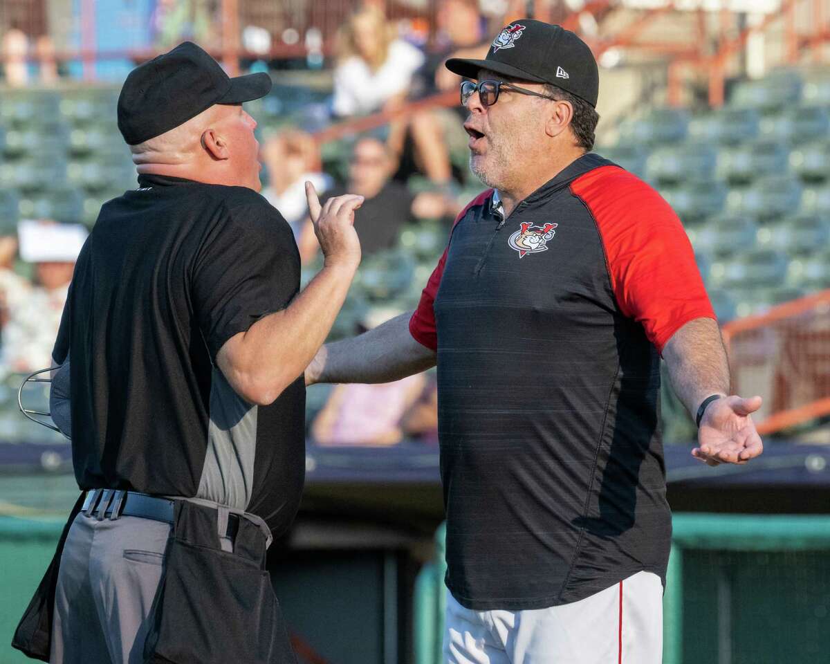 Tri-City ValleyCats manager Pete Incaviglia has words with the home plate umpire over whether the batting helmets should have two ear guards. Incaviglia was ejected from the Frontier League game against the New Jersey Jackals at the Joseph L. Bruno Stadium on the Hudson Valley Community College campus in Troy, NY, on Tuesday, June 14, 2022. (Jim Franco/Special to the Times Union)