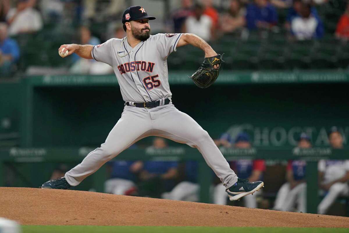 Houston Astros starting pitcher Jose Urquidy throws during the first inning of the team's baseball game against the Texas Rangers in Arlington, Texas, Tuesday, June 14, 2022. (AP Photo/LM Otero)