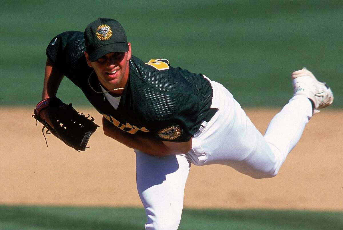 16 Mar 2000: Pitcher Tim Kubinski #58 of the Oakland Athletics pitches the ball during the Spring Training Game against the Anaheim Angels at Phoenix Municipal Stadium in Phoenix, Arizona. The Athletics defeated the Angels 4-3.
