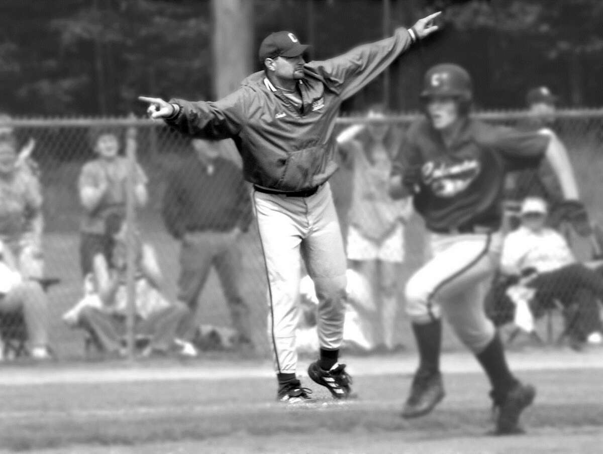 Former Coleman baseball coach Dave Mammel directs traffic from the third-base box in this undated photo.