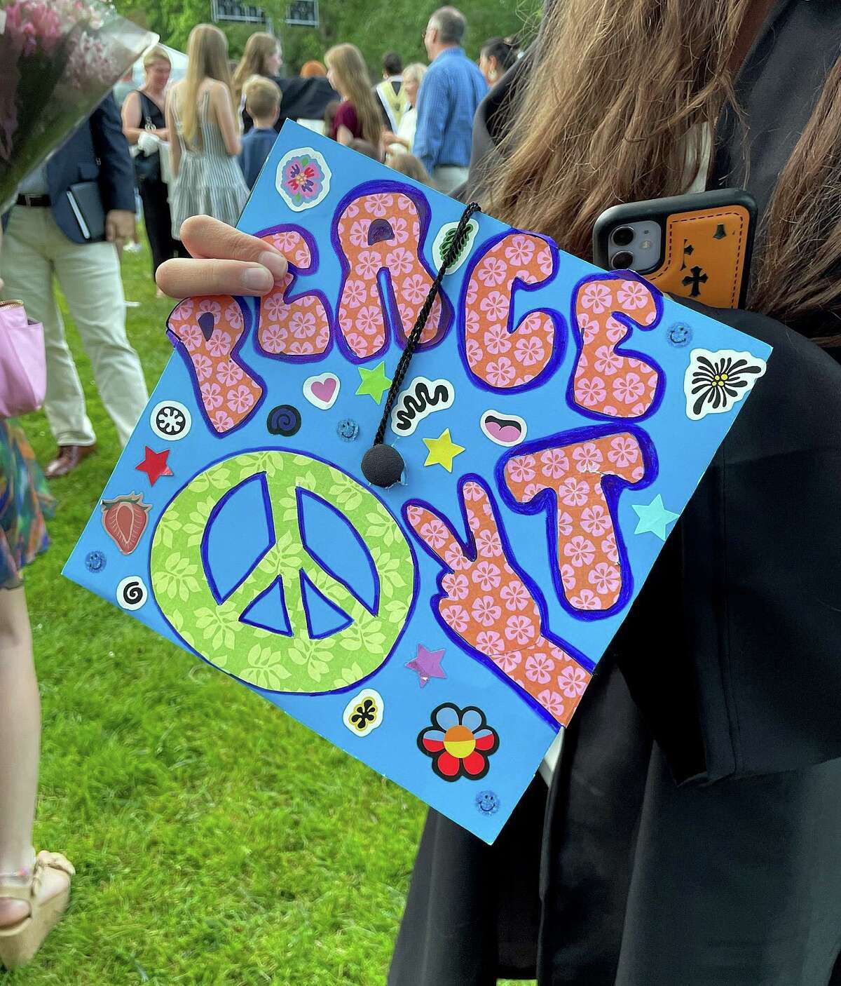 Creatively decorated mortarboards at Madison's Daniel Hand High School graduation. The ceremony was held on the First Congregational Church lawn on Tuesday, June 14.