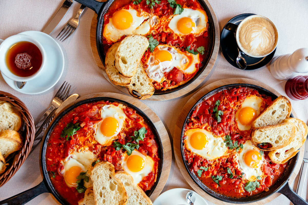 Shakshuka is a North African dish where eggs are poached by being dropped into a tomato-based stew while it cooks.