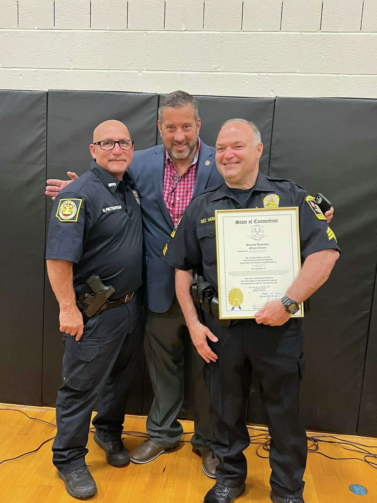 Two members of the Winchester Police Department were recently recognized for their long-term leadership of the D.A.R.E. program during its graduation ceremony. The D.A.R.E. (Drug Abuse Resistance Education) program is taught by Winchester's Officer Daniel Pietrafesa, left, and Sergeant (retired) Bob Varasconi. The officers were presented with a legislative citation from State Rep. Jay Case, R-Winsted in recognition of their contributions to the program.
