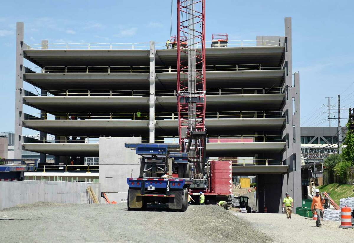Construction continues on the Stamford Transportation Center parking garage in Stamford, Conn. Wednesday, June 15, 2022. Contractors are on track to complete the second stage of the almost-1,000 spot parking garage by September, with total completion anticipated by summer of 2023.