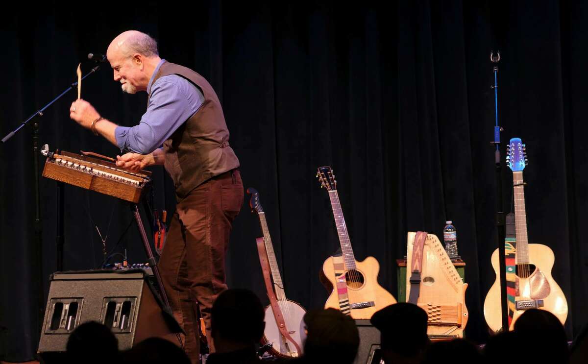 John McCutcheon, seen here playing hammered dulcimer and flanked by some of the 15 or so other instruments he plays, has been called the Renaissance man of folk music. He will be making a return appearance to the Old Songs Festival, being held at the Altamont Fairgrounds from June 24 to 26, 2022.