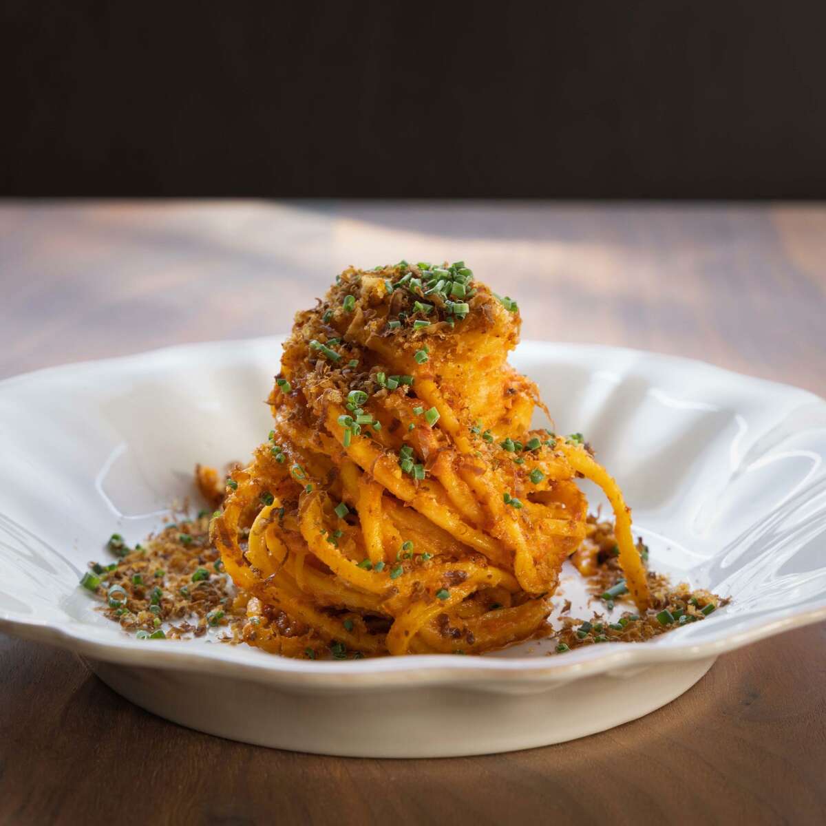 A towering plate of delicious pasta from Sorella, part of the Acquerello family.