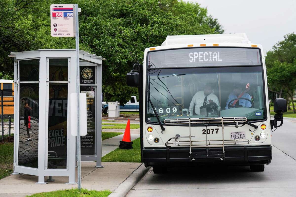 A Metropolitan Transit Authority bus pulls into a bus shelter designed by students at Eisenhower High School Monday, May 23, 2022 in Houston.