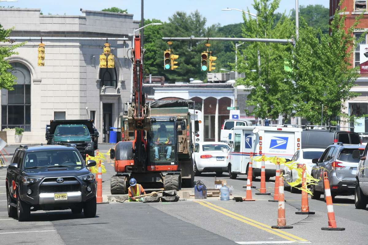 Construction work along Wall Street in Norwalk on Wednesday.