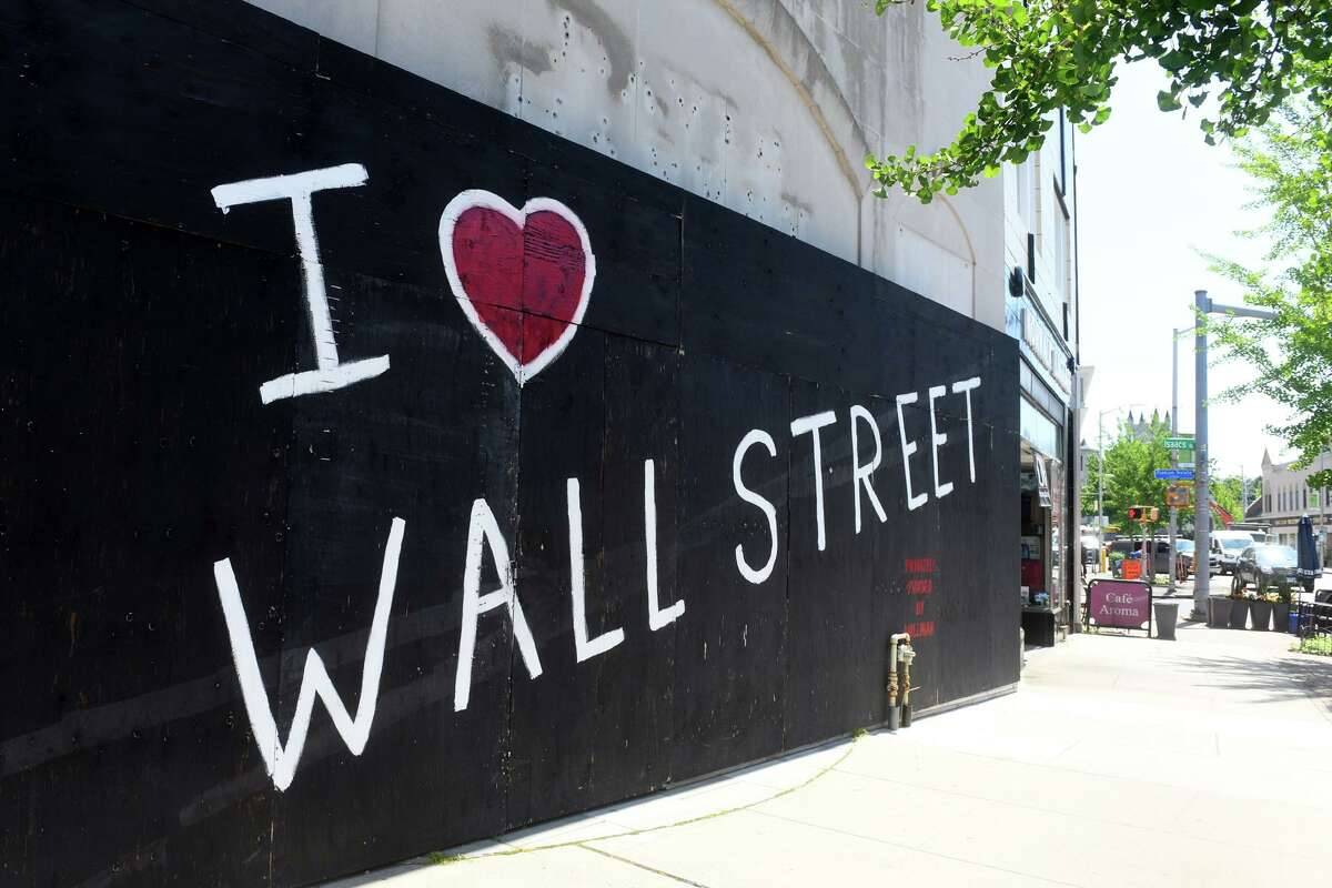 The message 'I Heart Wall Street' is painted on an empty storefront on Wall Street, in Norwalk, Conn. June 15, 2022.