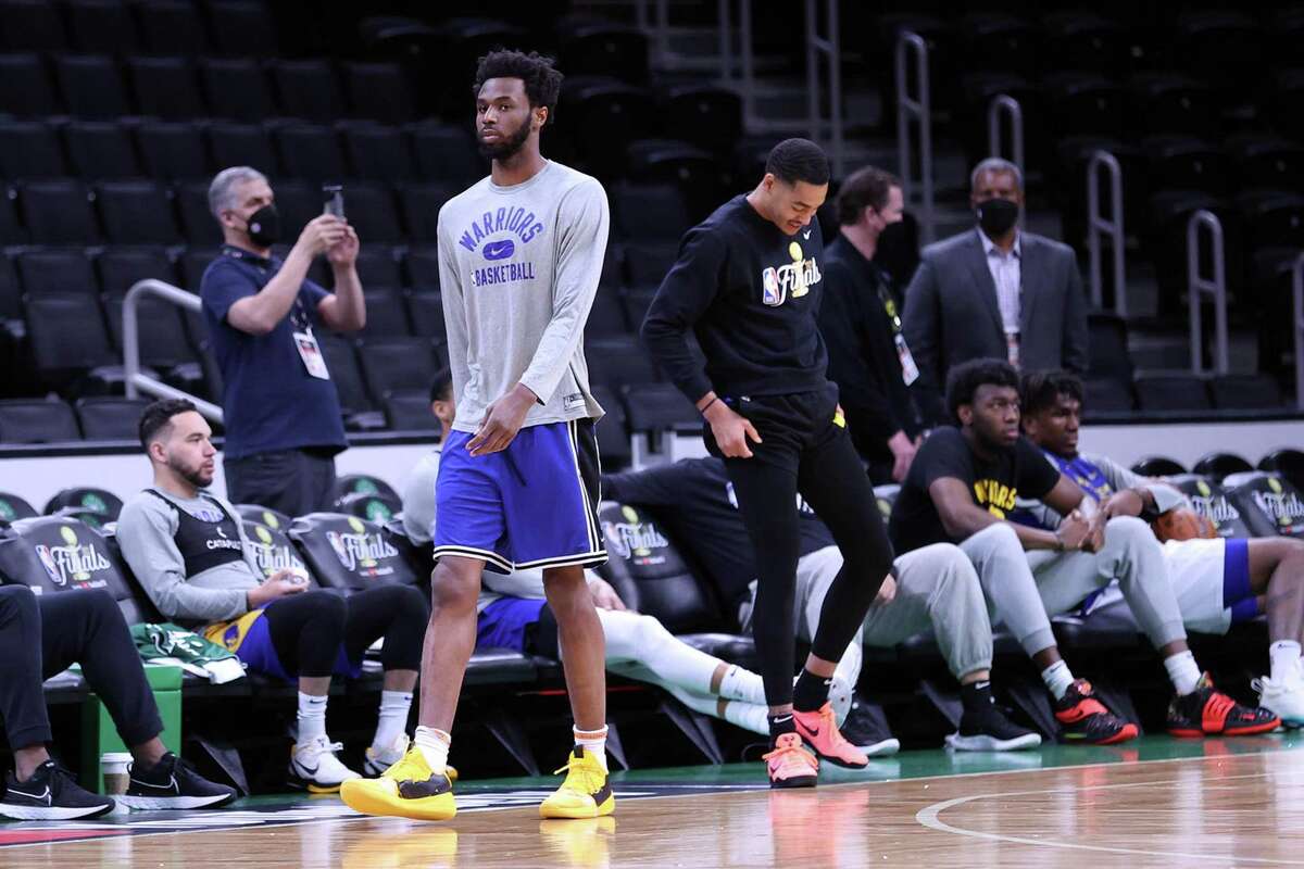 Golden State Warriors’ Andrew Wiggins and Jordan Poole get ready for practice during NBA Finals at TD Garden in Boston Mass.,, on Wednesday, June 15, 2022.
