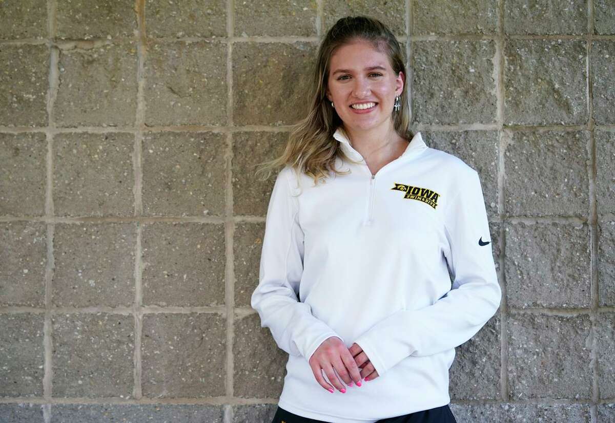 Former Iowa swimmer Sage Ohlensehlen was the point person for women's athletes at the school who sued in late 2020 after the athletic department said it would cut men's and women's swimming and diving, men's tennis and men's gymnastics.
