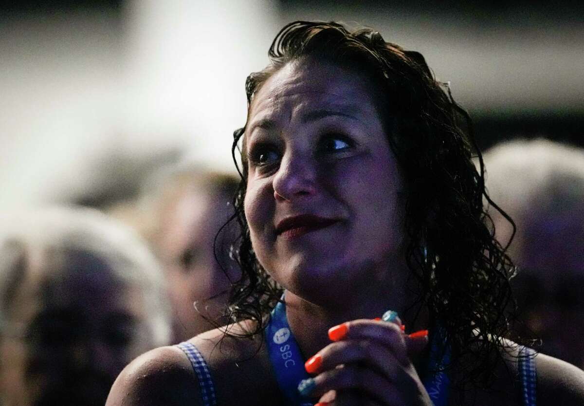 Abuse survivor Jules Woodson watches as Southern Baptists move through the procedural steps to pass a resolution supporting consistent laws regarding pastoral sexual abuse during the 2022 SBC Annual Meeting on Wednesday, June 15, 2022, at the Anaheim Convention Center in Anaheim.