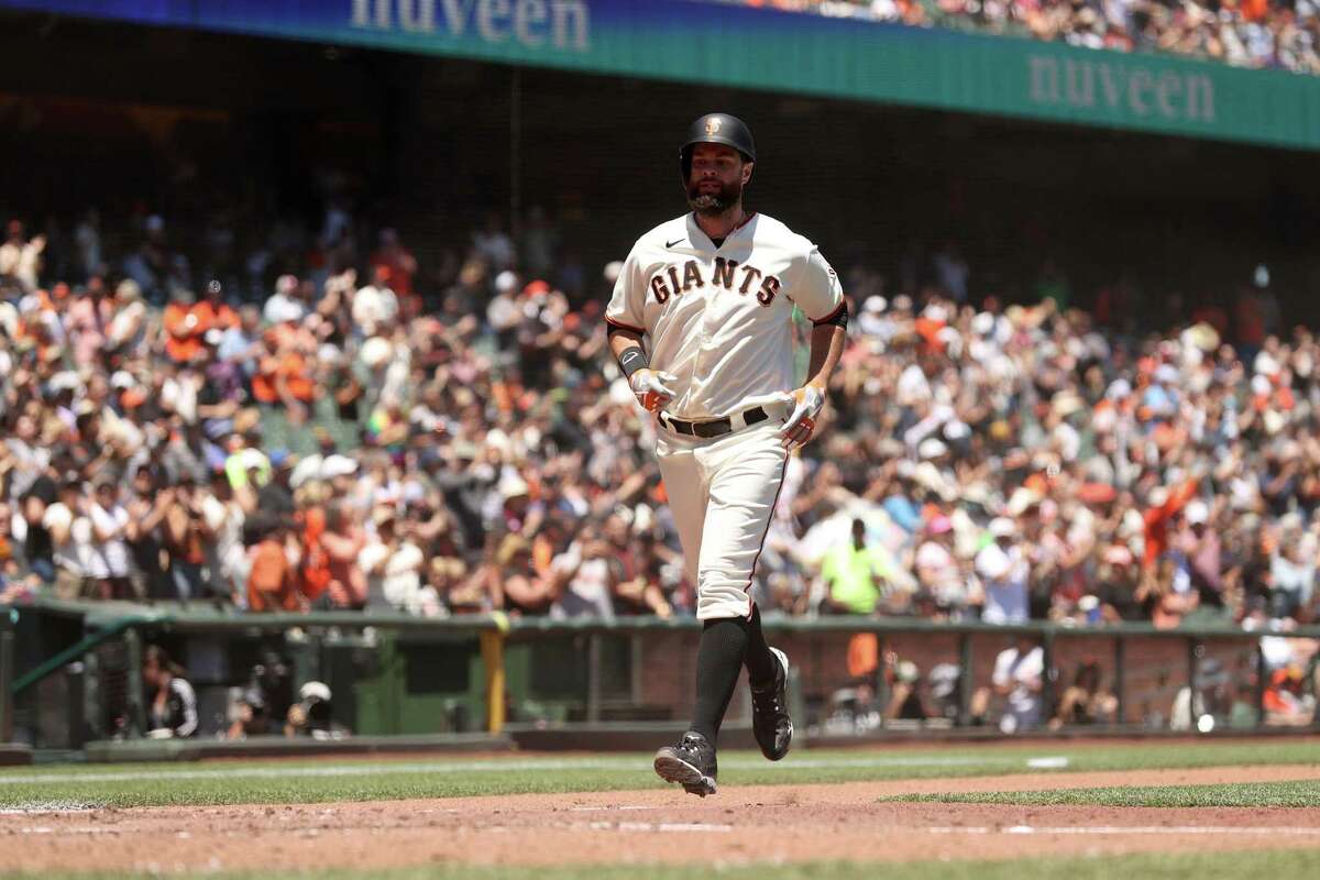 SAN FRANCISCO, CALIFORNIA - JUNE 15: Brandon Belt #9 of the San Francisco Giants rounds the bases after hitting a home runi n the fourth inning \akc at Oracle Park on June 15, 2022 in San Francisco, California. (Photo by Ezra Shaw/Getty Images)