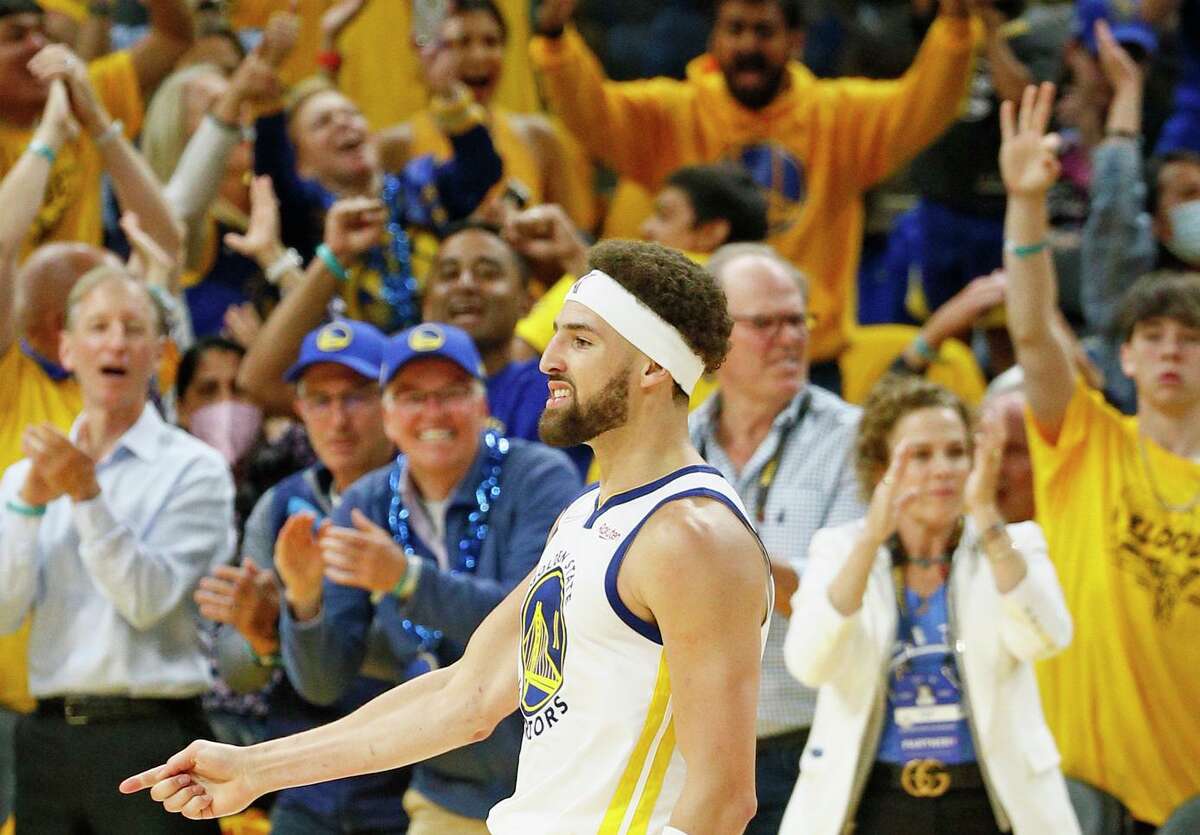 The Warriors’ Klay Thompson reacts after hitting a three-point shot against the Celtics in the fourth quarter of Game 5 at Chase Center.