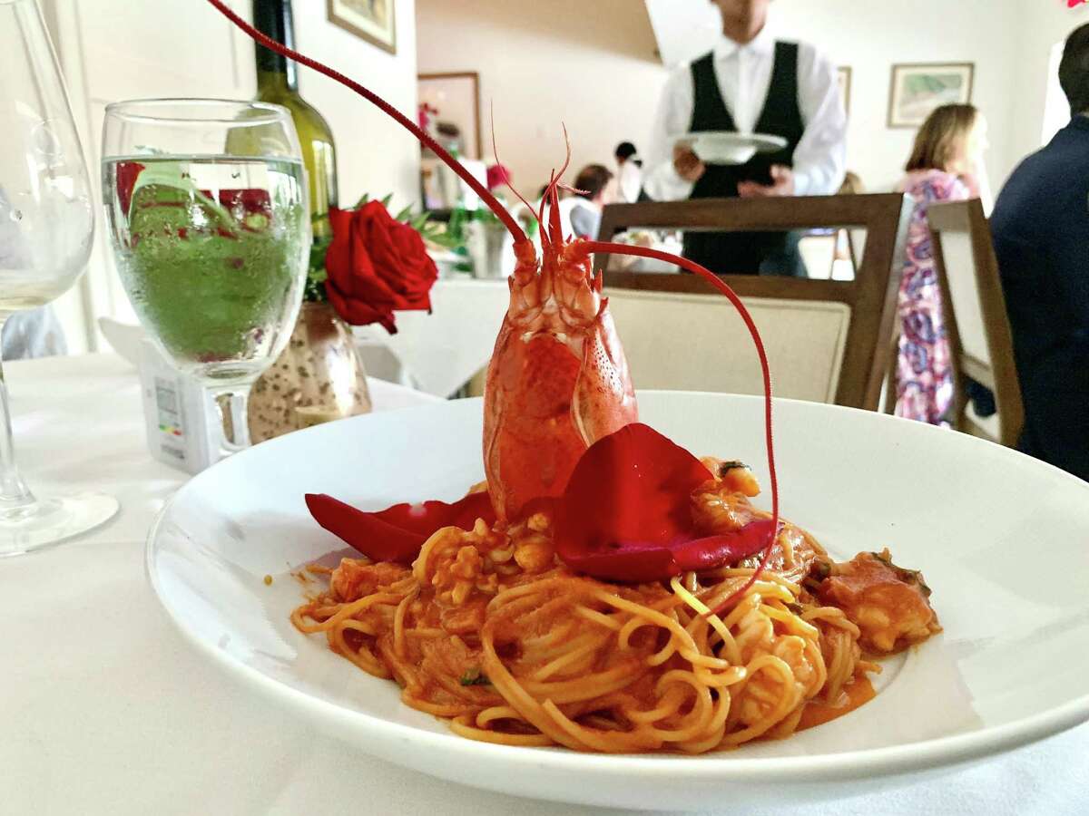 Harry's Bar spaghetti at Amore Italian restaurant, with lobster, brandy, tomato and mint