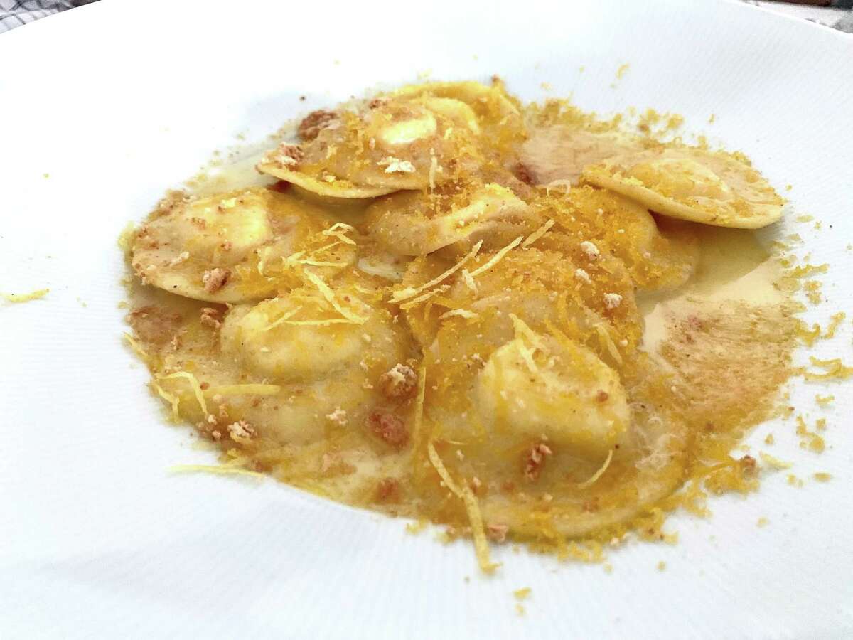 Occhi ravioli at Amore Italian restaurant, with sheep's milk ricotta, bottarga, fresh horseradish, Meyer lemon and extra virgin olive oil