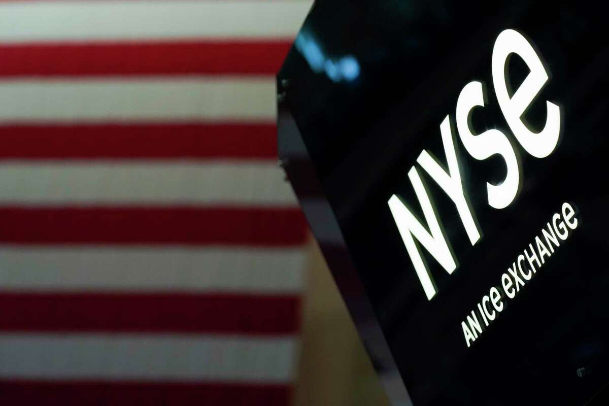 An NYSE sign is seen on the floor at the New York Stock Exchange in New York, Wednesday, June 15, 2022. Wall Street got back to selling on Thursday, reversing course a day after a climbing on hopes that the Federal Reserve's huge interest rate hike it made this week won't be a common practice in its ongoing fight against inflation. Stocks were opening sharply lower, sending the S&P 500 down 2.7%, and Treasury yields were moving higher again.