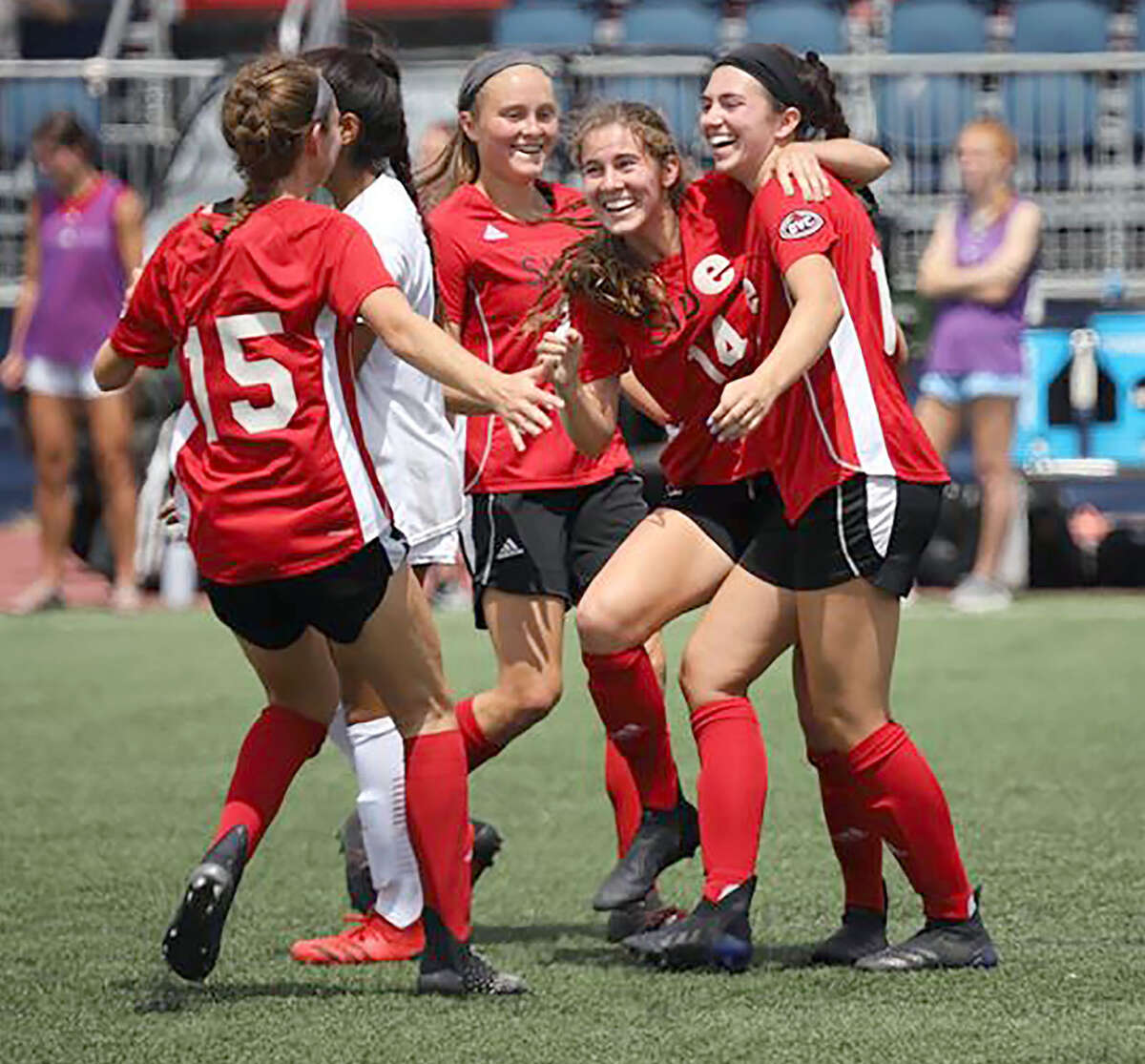 Members of the SIUE women's soccer team celebrate during a 5-2 victory at IUPUI last season. SIUE's 2022 schedule was announced Thursday.