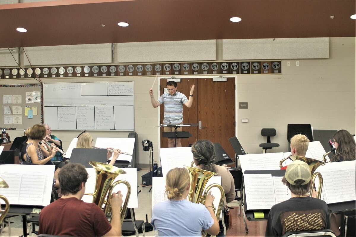 The Manistee Community Band and Chamber Choir rehearses Tuesday at the Manistee Middle High School band room.