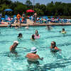 Families cool off from temperatures in the high 80s at Plymouth Pool Thursday, June 16, 2022 in Midland.