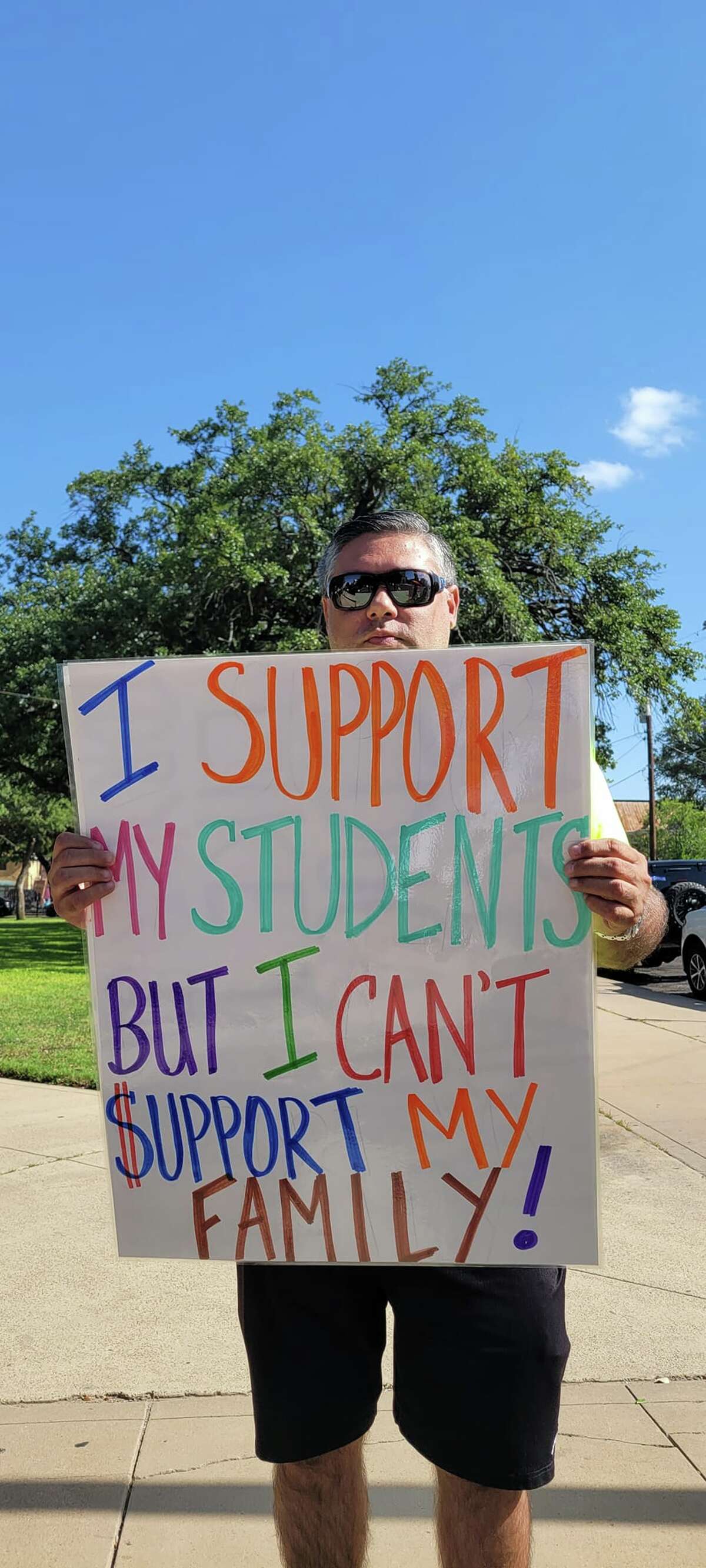 LISD Employees and TSTA representatives protest outside of the LISD board room prior to a board meeting demanding for a salary increase amid rising inflation and increasing gas prices on Tuesday, June 14, 2022.