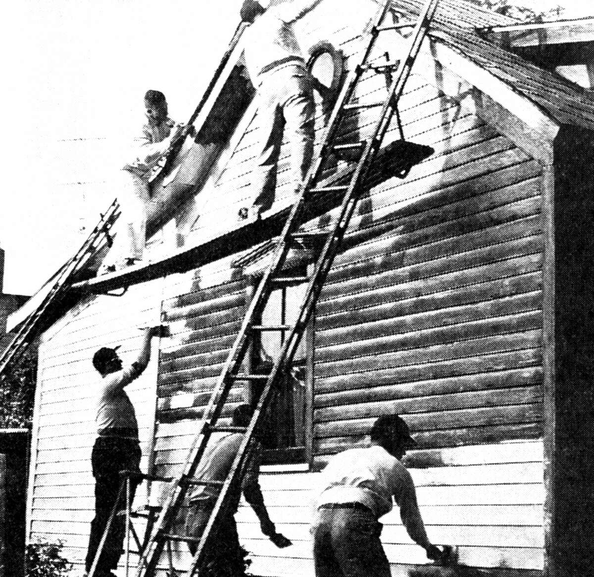 The Manistee Jaycees started the first of their new projects for summer and fall with a community improvement project in Manistee painting the house on the corner of Ninth and High streets last evening. The photo was published in the News Advocate on June 21, 1962.