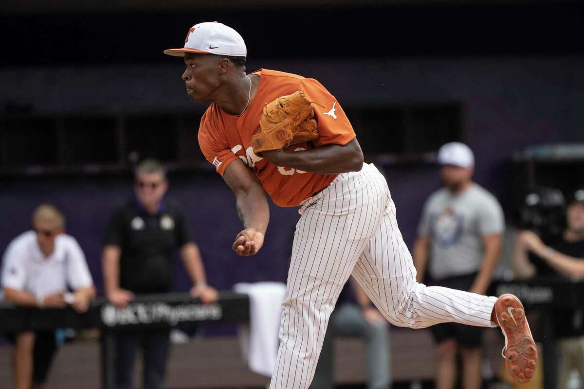 Texas' Andre Duplantier II throws a pitch during the ninth inning of an NCAA college super regional baseball game against East Carolina on Saturday, June 11, 2022, in Greenville, N.C. (AP Photo/Matt Kelley)