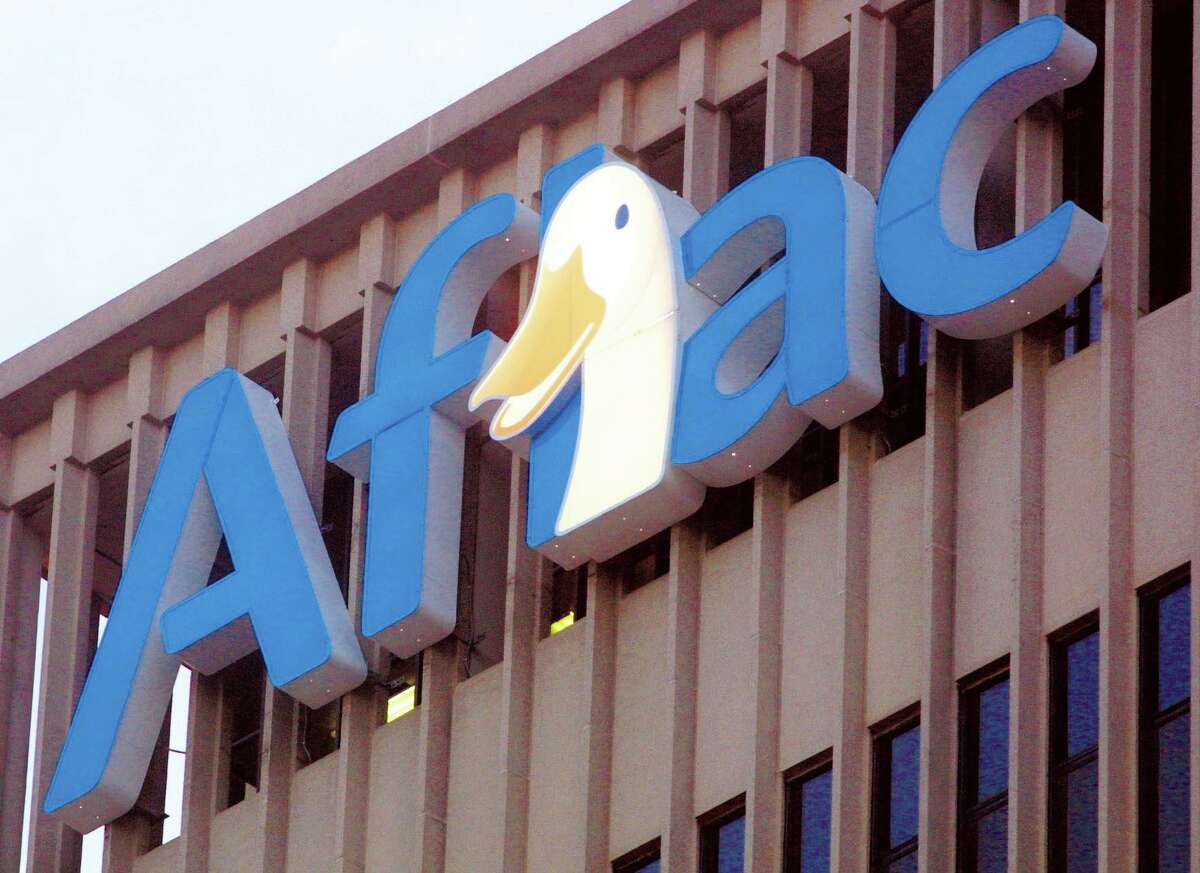 The trademark Aflac duck looks out over Columbus, Ga., from atop the company headquarters, in a file photo.