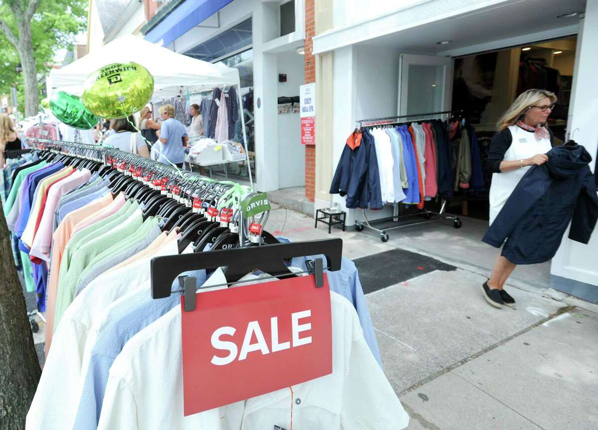 Shoppers hunt for bargains as they stroll up and down Greenwich Avenue during the Greenwich Chamber of Commerce’s Sidewalk Sales Day on July 11, 2019. It’s the biggest shopping event of the year, with over 100 stores participating and super bargains offered during this four-day shopping extravaganza, which returns next month.