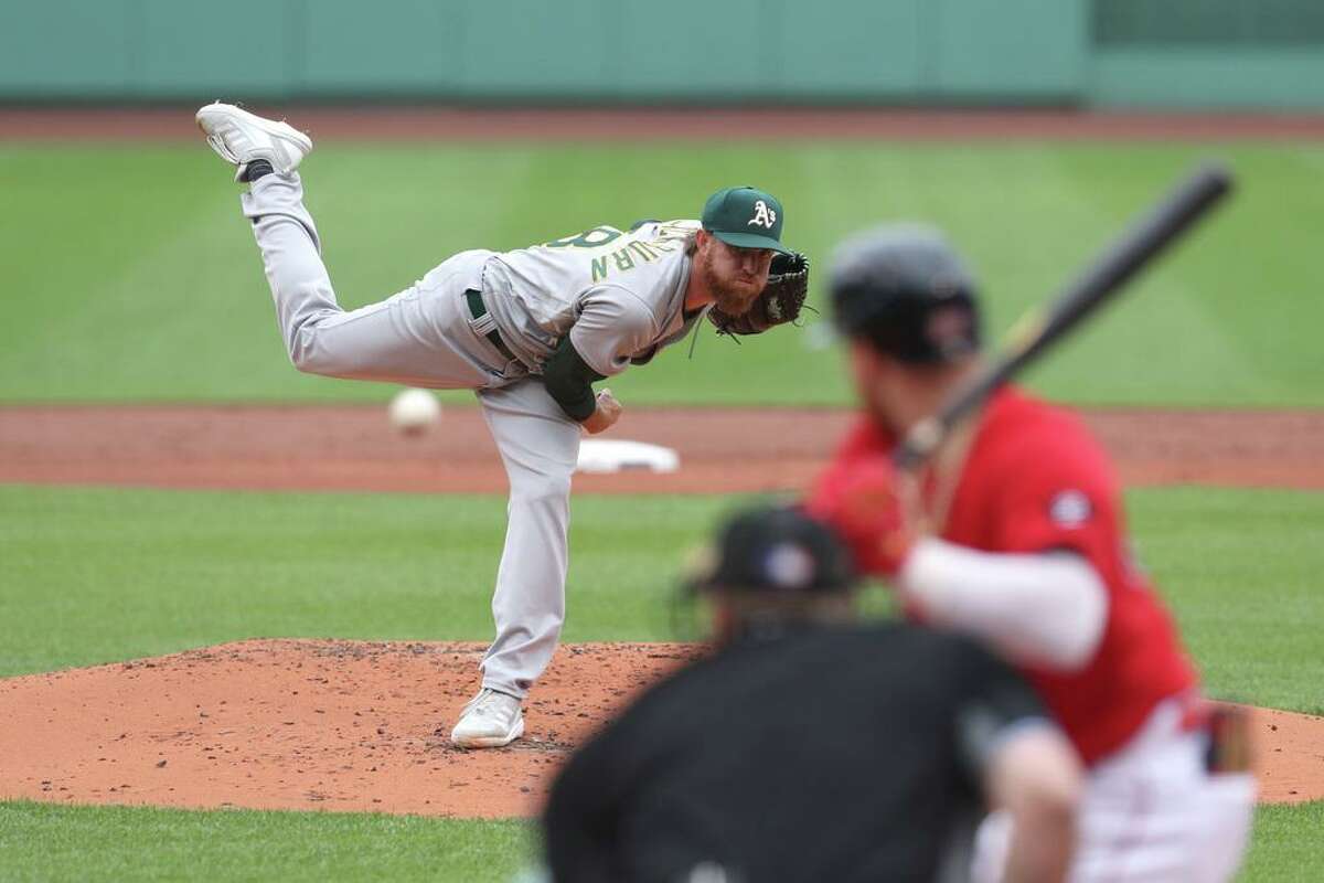 BOSTON, MASSACHUSETTS - JUNE 16: Paul Blackburn #58 of the Oakland Athletics throws a pitch during the first inning against the Boston Red Sox at Fenway Park on June 16, 2022 in Boston, Massachusetts. (Photo by Paul Rutherford/Getty Images)