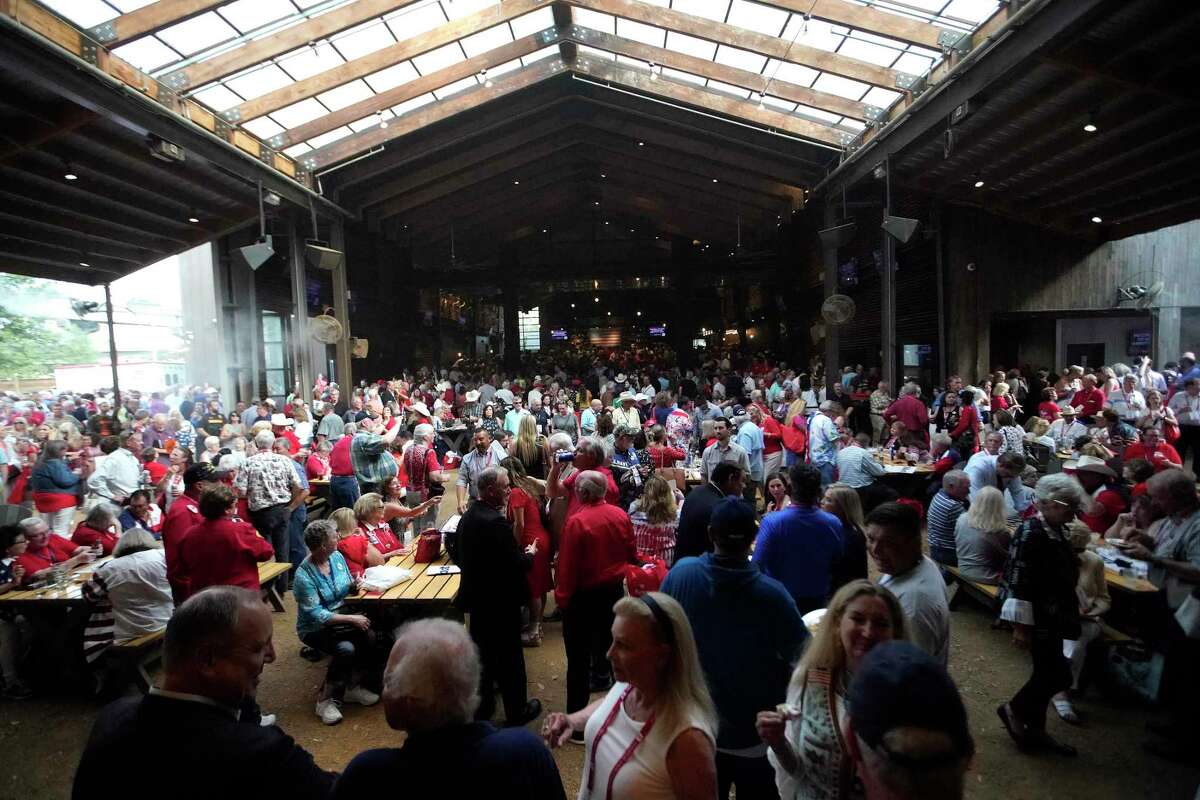 A crowd gathers before Texas Governor Greg Abbott spoke at an event at The Rustic on Thursday, June 16, 2022 in Houston. Abbott is skipping the GOP convention at the George R. Brown Convention Center, which is an unusual move for a sitting governor to skip the state convention.