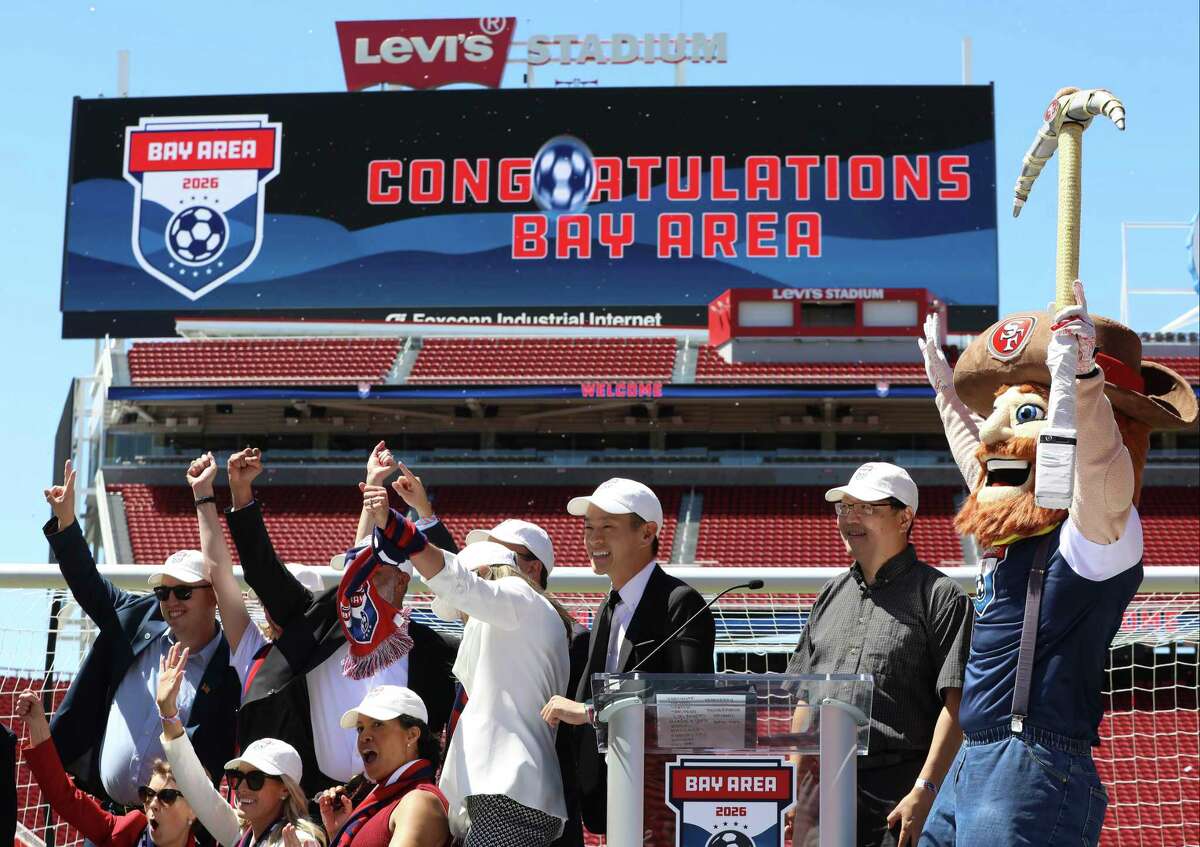 Officials celebrate onstage following the announcement that San Francisco will be a host city during FIFA World Cup 2026 at Levi’s Stadium on Thursday, June 16, 2022, in Santa Clara, Calif.