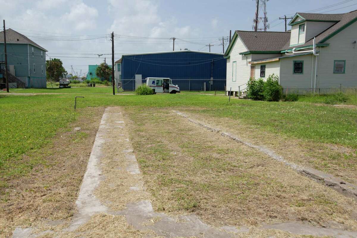 The empty lots at the corner of Church and 27th Streets used to be a part of the Black business district in the 1950s, older Black Galvestonians recall on Wednesday, June 15, 2022, in Galveston. They said there used to be a hotel on the left side of this lot, a BBQ joint and a cafe on the other side of the street. Now, there are only a handful of Black-owned businesses on the island. Anthony Griffin, who has been living in Galveston since late 1970s and owns the lots in this photo, is hoping to redevelop this section and make it a business district again.