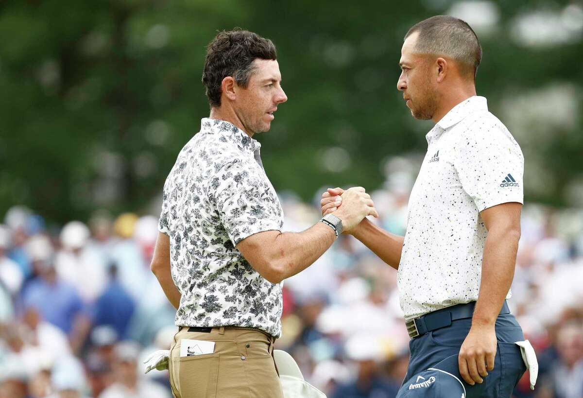 Rory McIlroy (left) and Xander Schauffele will be in action at the U.S. Open in Brookline, Mass., on Friday. (USA Network at 6:30 a.m.; Channel: 11Channel: 3Channel: 8 at 1 p.m.)