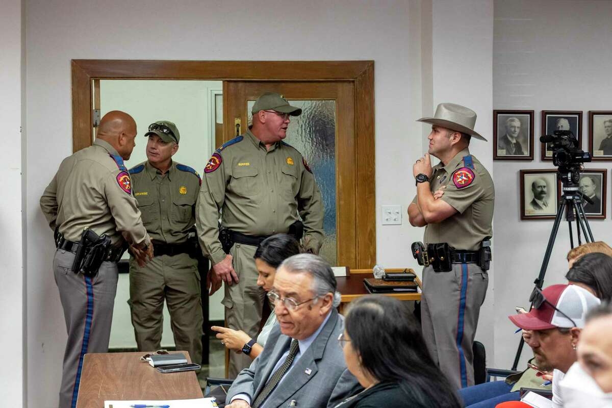 Texas DPS Officers mill about before a special House committee hearing on the massacre at Robb Elementary School at Uvalde City Hall in Uvalde, TX, on June 16, 2022.