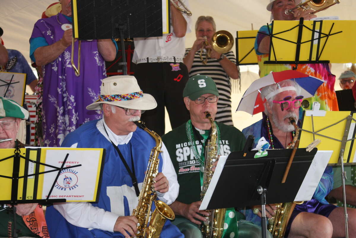 The Scottville Clown Band has a roster of approximately 250 members who are eligible to play, with the largest contingent, usually about 100, coming to town to play on the Fourth of July.