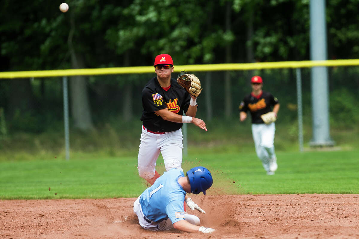 Berryhill's Logan McCoy turns a double play during a July 23, 2021 game against Petoskey.