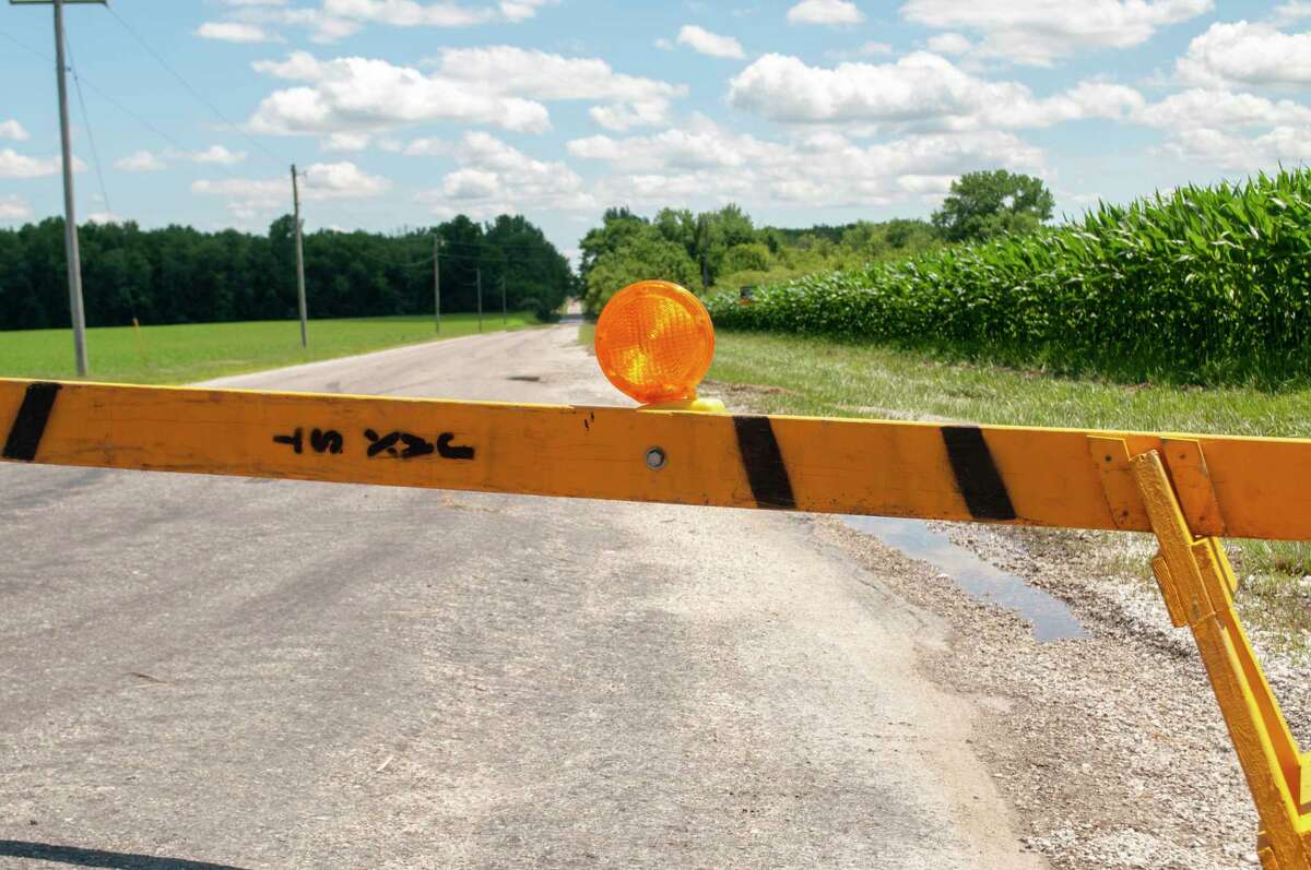 Woods Lane was closed Friday because of high water after a storm flooded many parts of southern Morgan County.