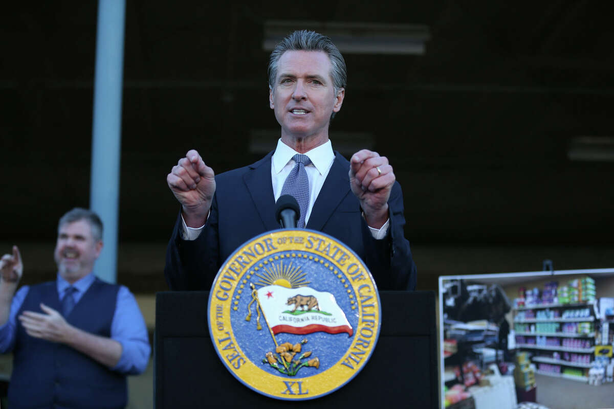 California Governor Gavin Newsom introduces new state efforts and proposed investments to fight and prevent crime across the state during a news conference in Dublin, Calif., on Friday, Dec. 17, 2021. (