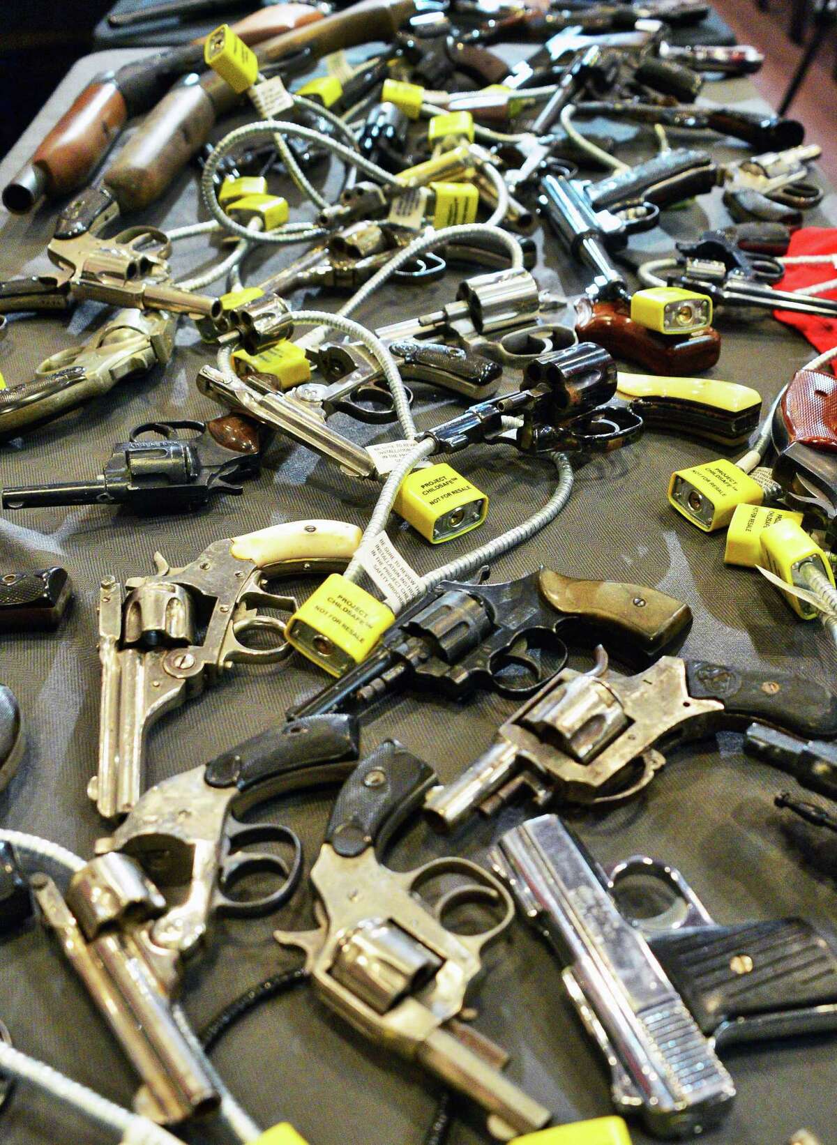 A file photo shows guns collected during a buy-back program