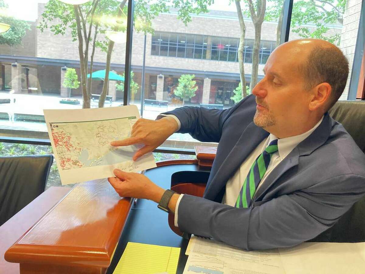 Beaumont's interim city manager Chris Boone points out a map indicating Municipal Management Districts in nearby areas such as the Bolivar Peninsula, but none in Beaumont. The city council approved the creation of the city's first MMD on June 14, 2022.
