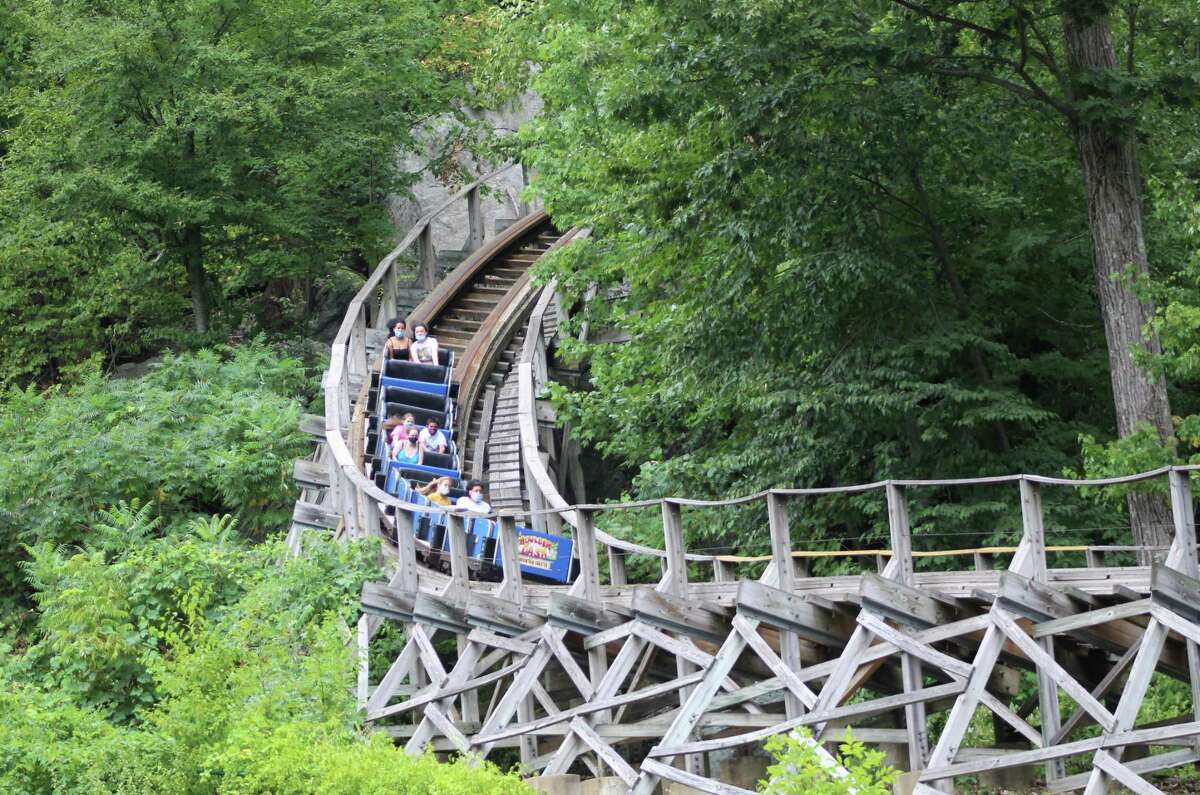 A Lake Compounce roller coaster operating during the COVID-19 pandemic. Adopting regular summer hours in mid-June, the Bristol amusement park was still looking to fill 40 percent of its available positions for the summer of 2022 but with applications coming in.