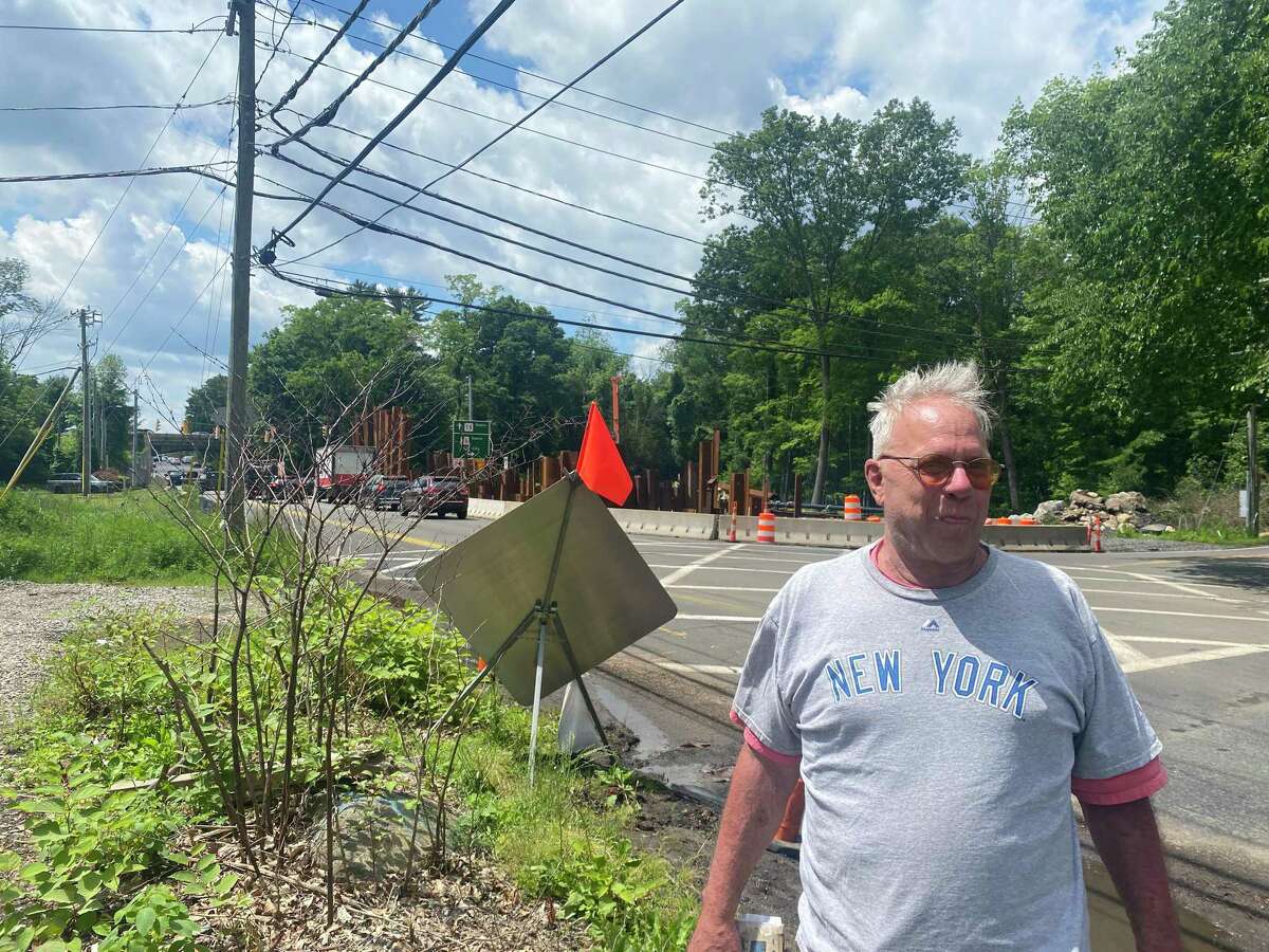 North Stamford resident Ken Bollettieri lives up the street from a construction project on High Ridge Rd. delayed for months because the city and Department of Transportation discovered an active sewer line on the site.