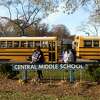Students wait to be picked up at dismissal at Central Middle School in Greenwich, Conn. Thursday, Nov. 21, 2019.