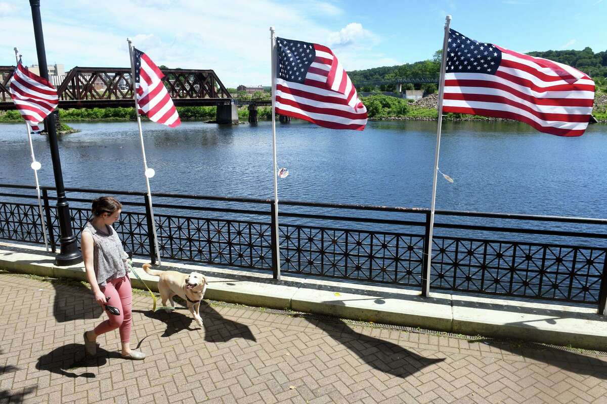 Hundreds of American flags are currently in place around Veterans Memorial Park, in Shelton, Conn. June 10, 2022.