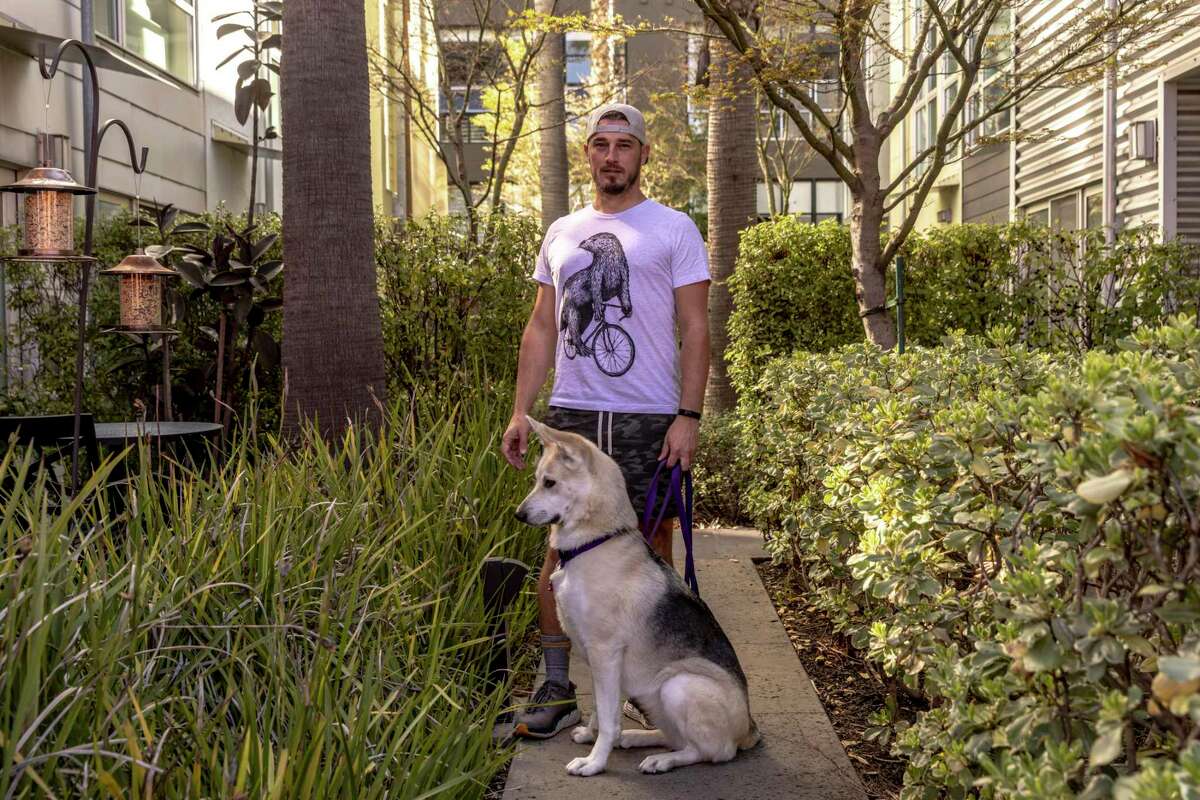 Emeryville Mayor John Bauters, shown with his rescue dog, Reyna, is one of the region’s few out LGBTQ elected leaders.