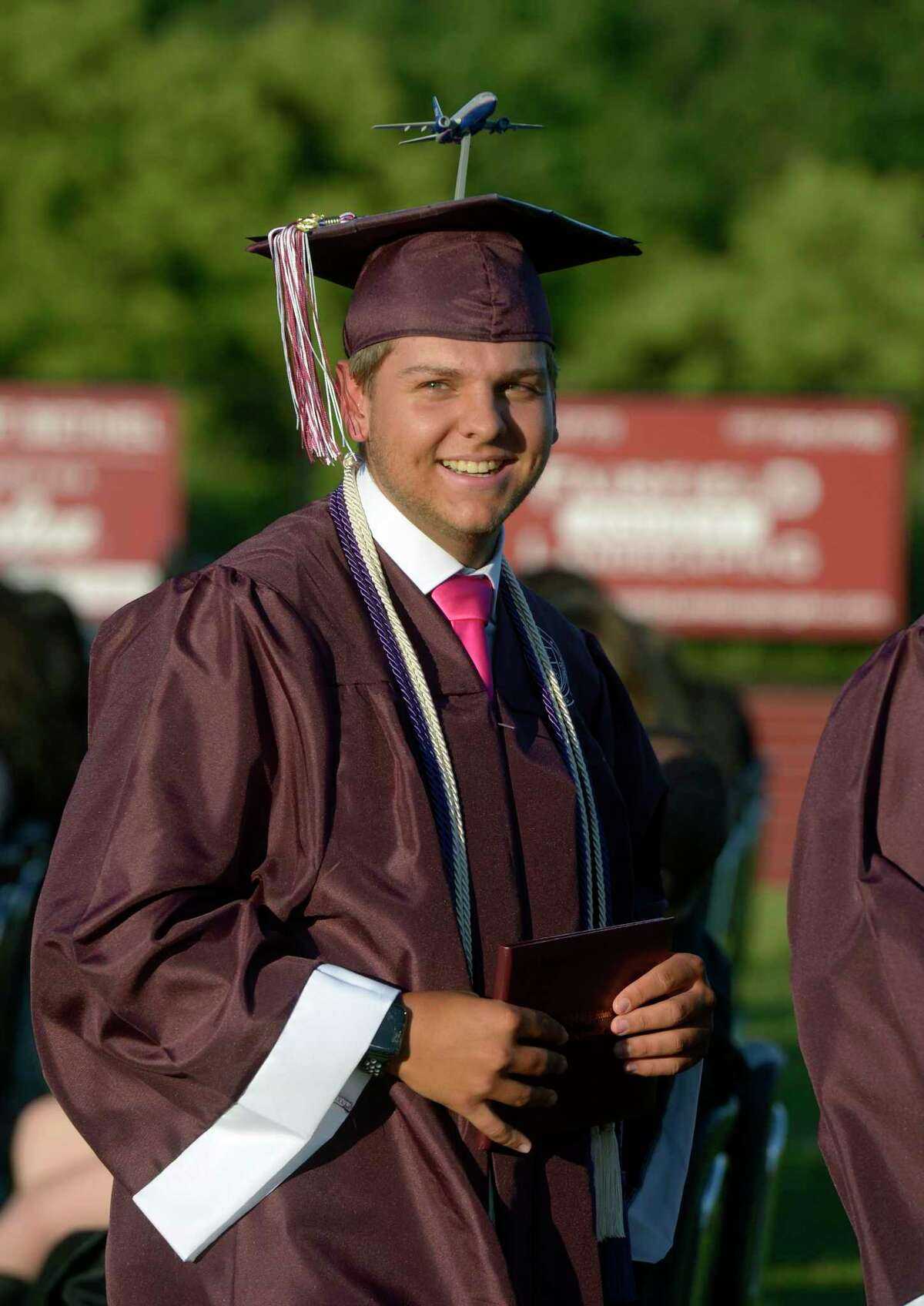 Adam Christopher Fawcett holds his diploma during the 2022 Bethel High School Graduation, Friday, June 17, 2022, Bethel, Conn.