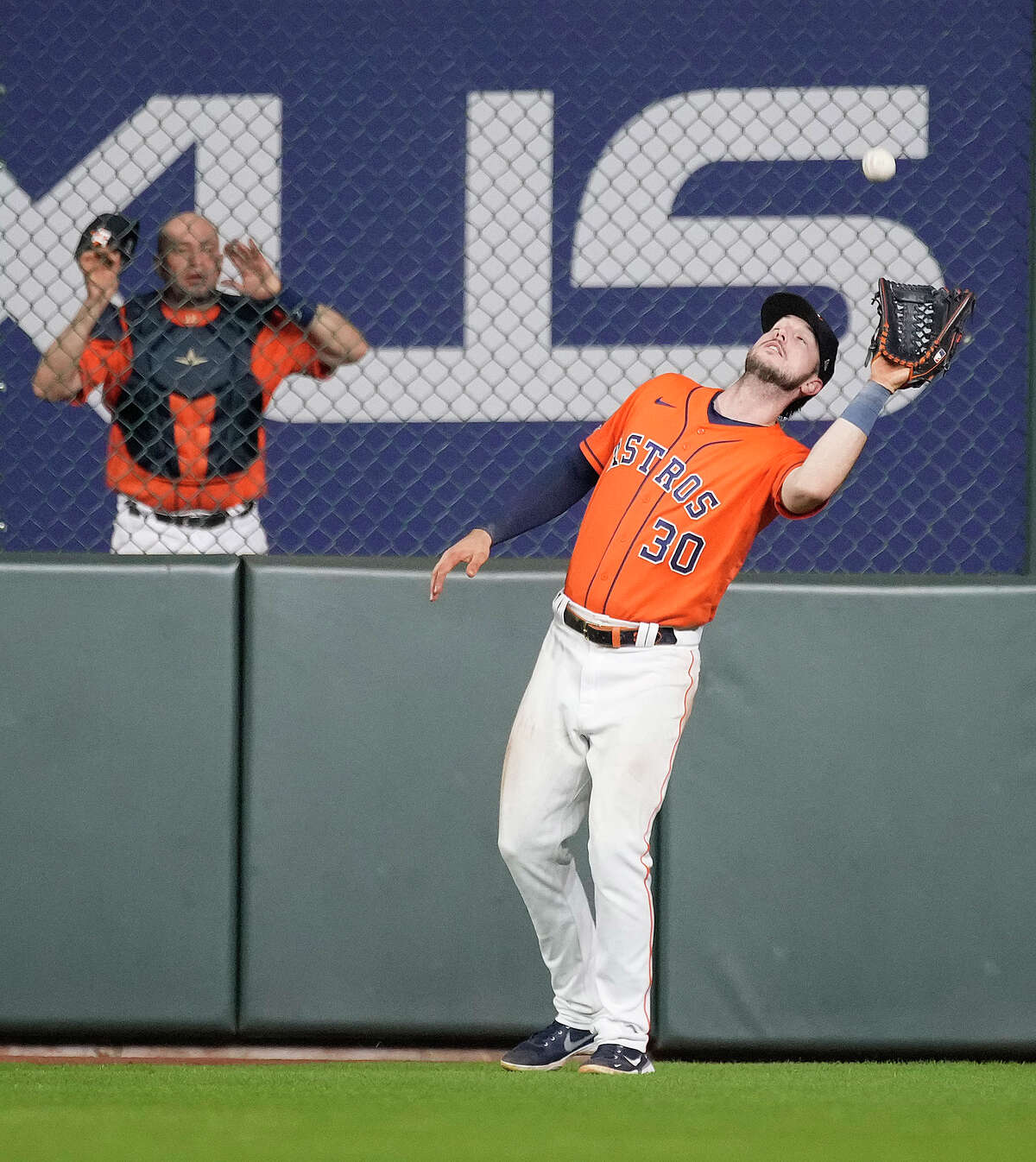 Houston Astros right fielder Kyle Tucker (30) catches Chicago White Sox Luis Robert's fly out during the eighth inning of an MLB game at Minute Maid Park on Friday, June 17, 2022 in Houston.