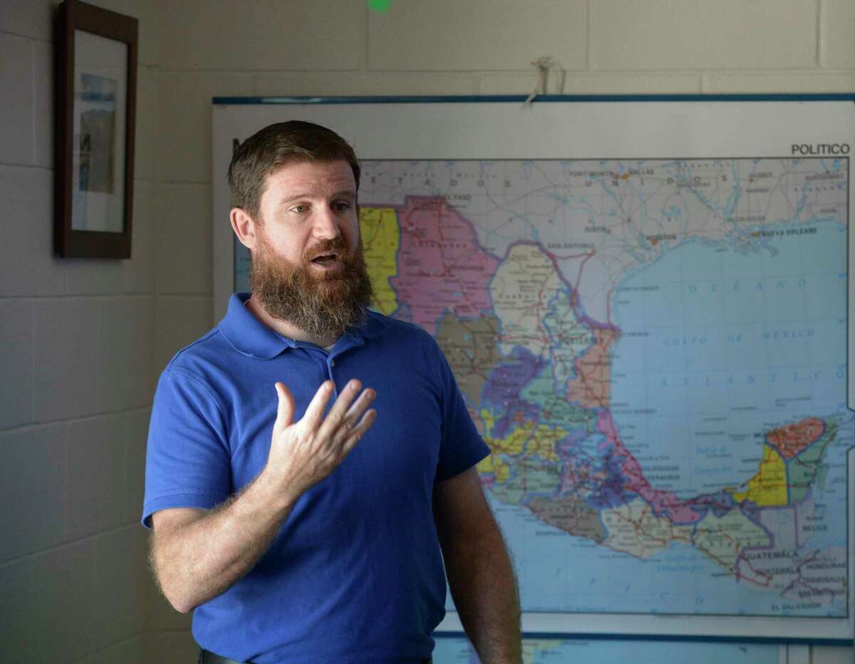 Mike Nolan, a Shepaug Valley School teacher, works with his Spanish 3 class last week.